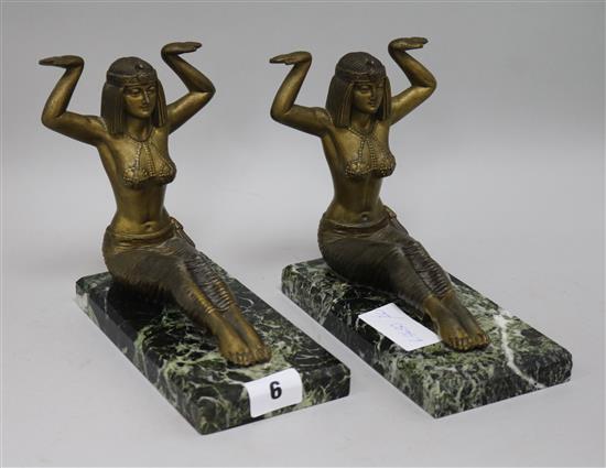A pair of Egyptian figurative book ends